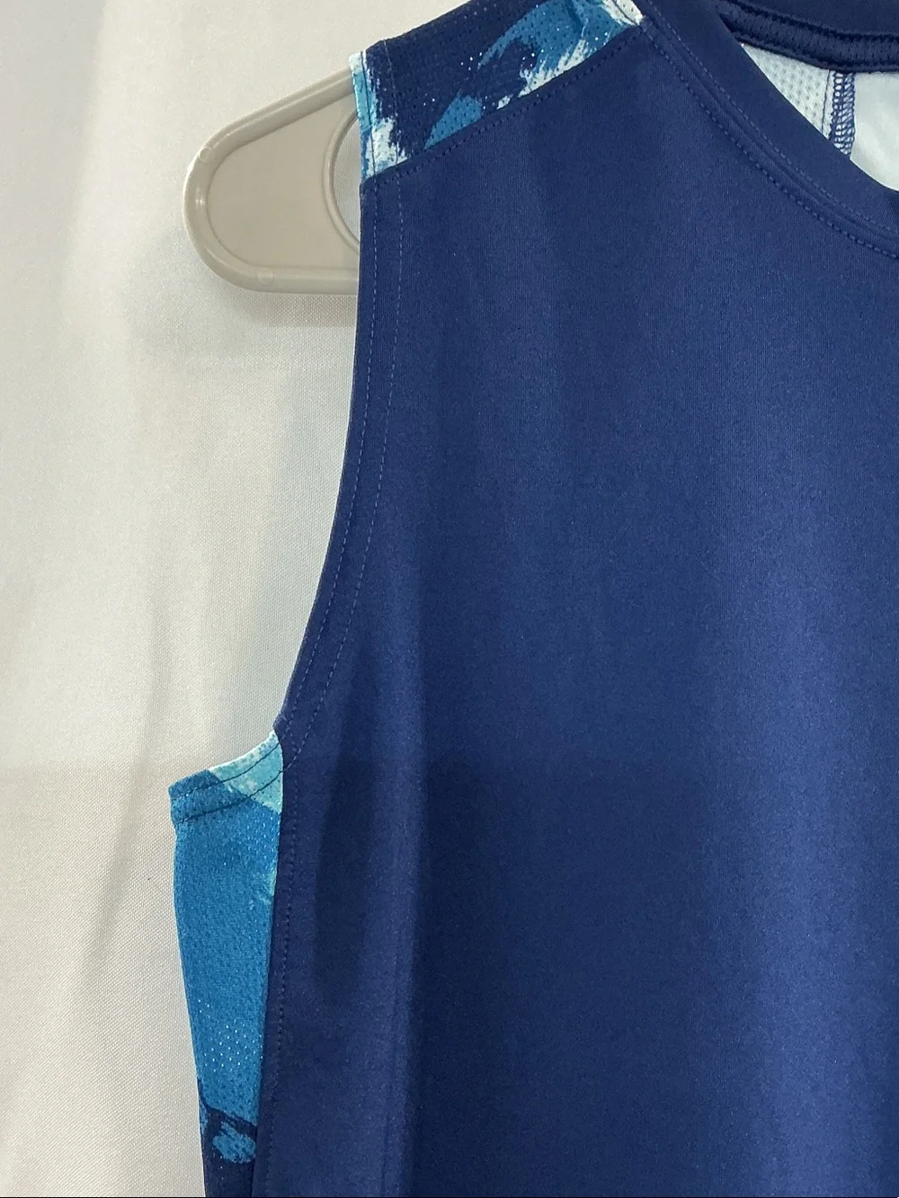 Nike Men’s Navy Tank Top with Light Blue Swoosh and Patterned Side Panels